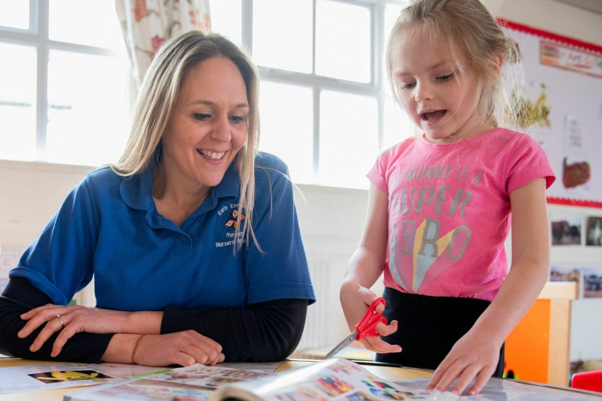 Early-years-practitioner-with-a-young-child-1200x800