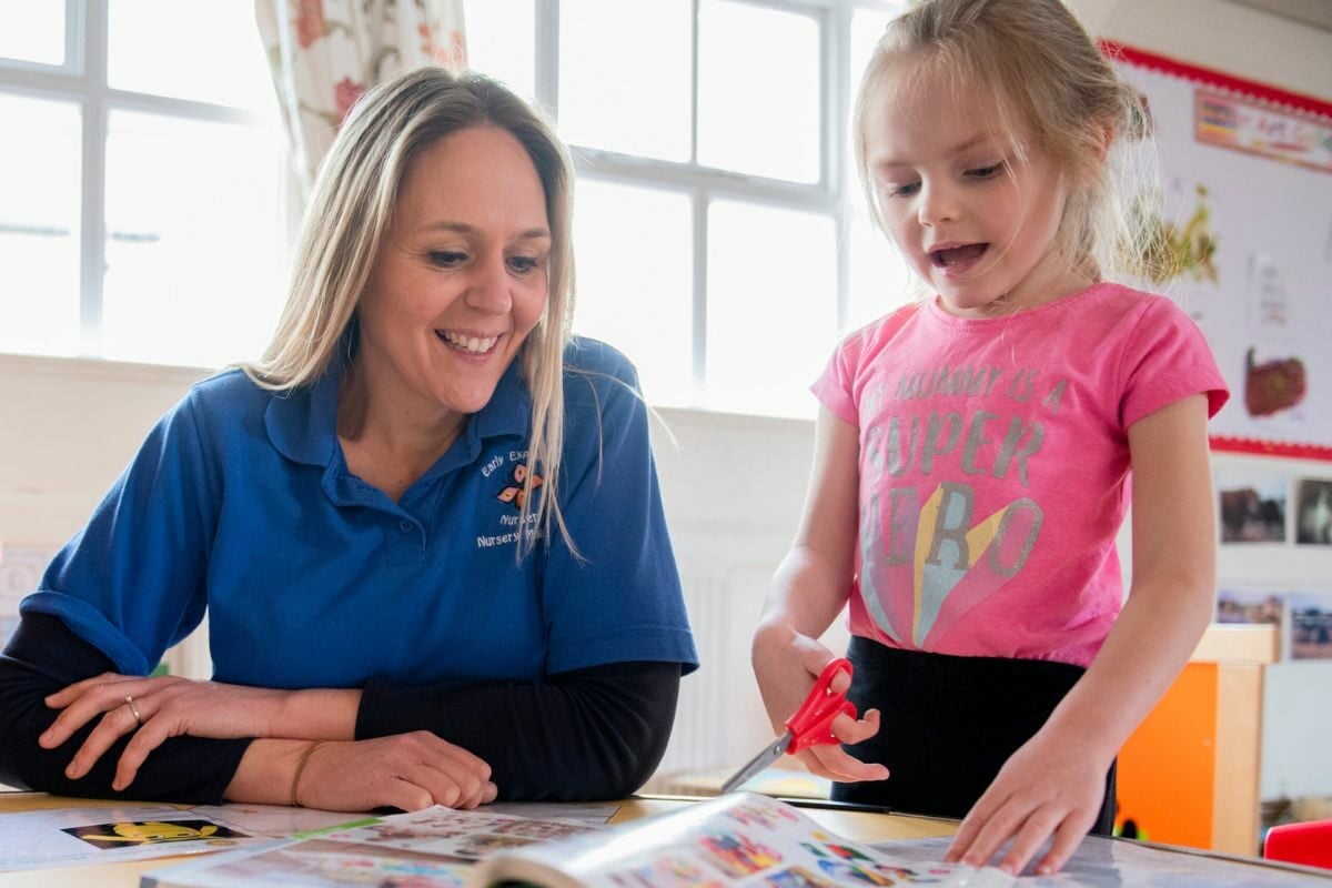Early-years-practitioner-with-a-young-child-1200x800